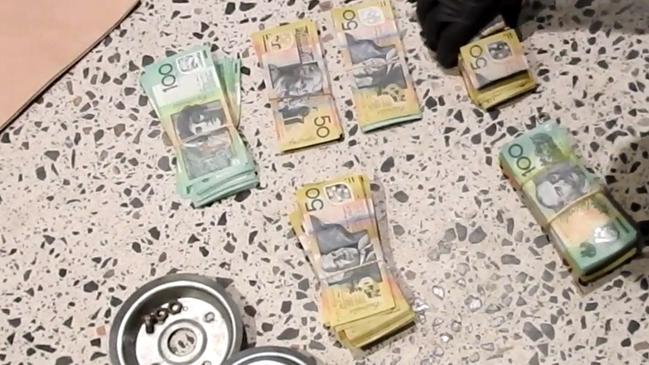 Officers found a large amount of cash at the premises. Picture: Australian Federal Police