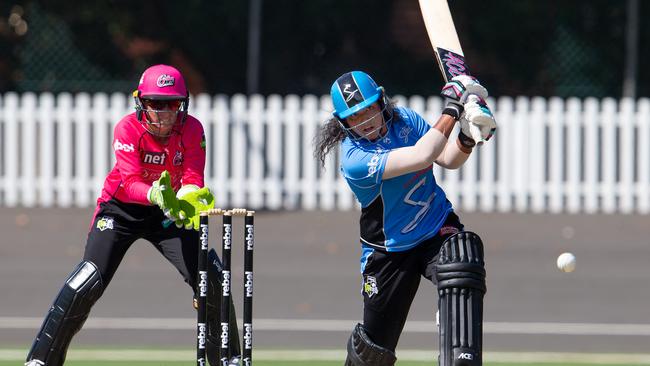 ROLTON MEDALLIST: Tabatha Saville drives while playing for the Adelaide Strikers during this year’s WBBL. Picture: Steve Christo (AAP)