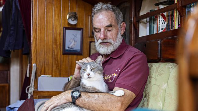 SYDNEY, AUSTRALIA, NOVEMBER 22, 2023. Sylph VI skipper and owner Robert â€˜Bobâ€™ Williams with his cat Oli who will sail with Bob in the Sydney to Hobart yacht race on board Sylph VI. Photographer: Adam Yip