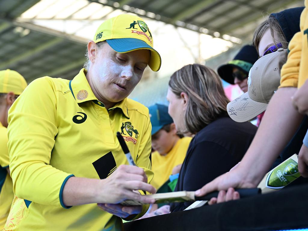 Alyssa Healy pictured signing autographs for fans at Bellerive Oval. Picture: Getty Images