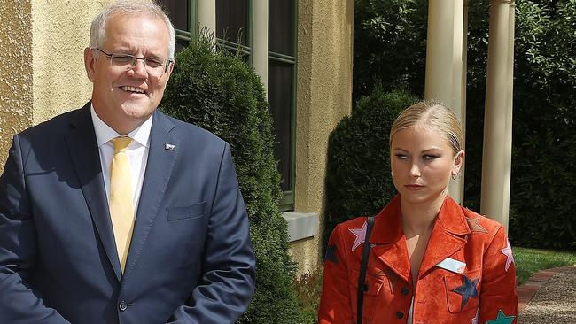 Scott Morrison copping the stink-eye from Grace Tame. Picture: Gary Ramage