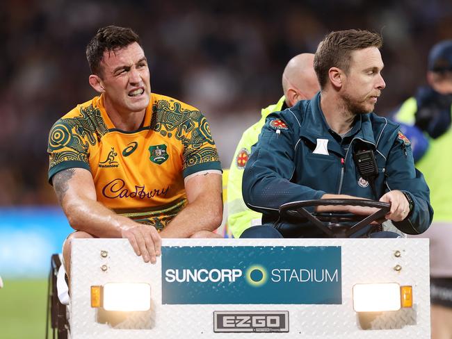 Cadeyrn Neville leaves Suncorp Stadium in a medicab. Picture: Mark Kolbe/Getty