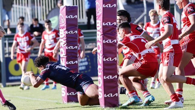 LANGER trophy schoolboy rugby league grand final between Palm Beach Currumbin SHS and Ipswich SHS. Ipswich SHS player Josiah Pahulu celebrates with teammates after a try. Picture: NIGEL HALLETT