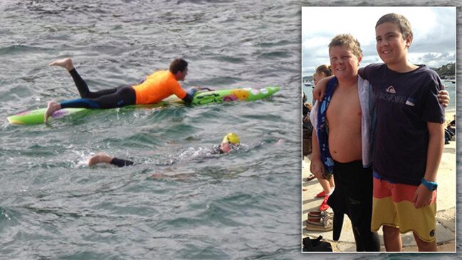 Ned swims for mate. Ned and Xavier after the race (inset).