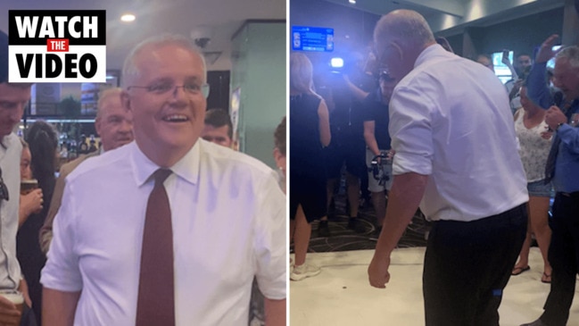 Scott Morrison plays two-up