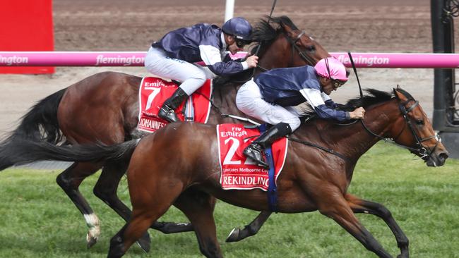 Rekindling with jockey Corey Brown wins the 2017 Emirates Melbourne Cup ahead of Johannes Vermeer.