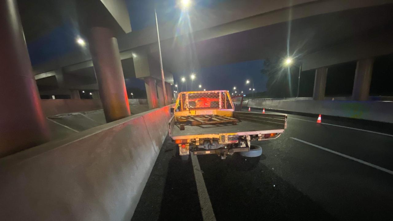 The red ute was parked on the Sunshine Coast motorway off ramp at Tanawha. Picture: Supplied.