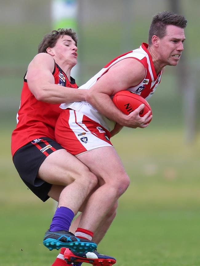 Stawell’s Jacob Salmi tackles Ararat’s Daniel Mendes.