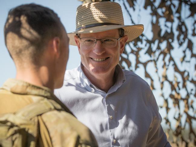 Minister for Veterans' Affairs and Defence Personnel the Honourable Andrew Gee MP, at the high fire power demonstration, at the Shoalwater Bay Training Area in Queensland, during Exercise Talisman Sabre 2021. *** Local Caption *** Exercise Talisman Sabre 2021 (TS21) is the largest bilateral training activity between Australia and the United States, commencing on 14 July 2021.  Held every two years, TS21 aims to test Australian interoperability with the United States and other participating forces in complex warfighting scenarios. In addition to the United States, TS21 involves participating forces from Canada, Japan, Republic of Korea, New Zealand, and the United Kingdom.  The exercise includes a Field Training Exercise incorporating force preparation (logistic) activities, amphibious landings, ground force manoeuvres, urban operations, air combat and maritime operations. Activities will peak from 18 - 31 July across Queensland.  TS21 is a major undertaking for all attending nations and demonstrates the combined capability to achieve large-scale operational outcomes within a COVID-19 safe environment.Picture:  Defence