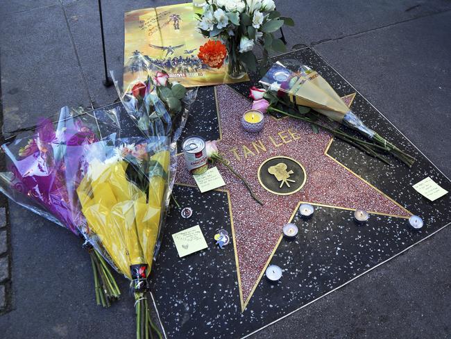 A wreath and other memorabilia adorn the star of Stan Lee on the Hollywood Walk of Fame. Picture: AP