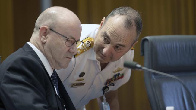 Greg Moriarty, Secretary of the Department of Defence, and Vice Chief of the Defence Force Vice Admiral David Johnston chat during estimates in Parliament House, Canberra, in 2020. Picture: NCA NewsWire/Gary Ramage