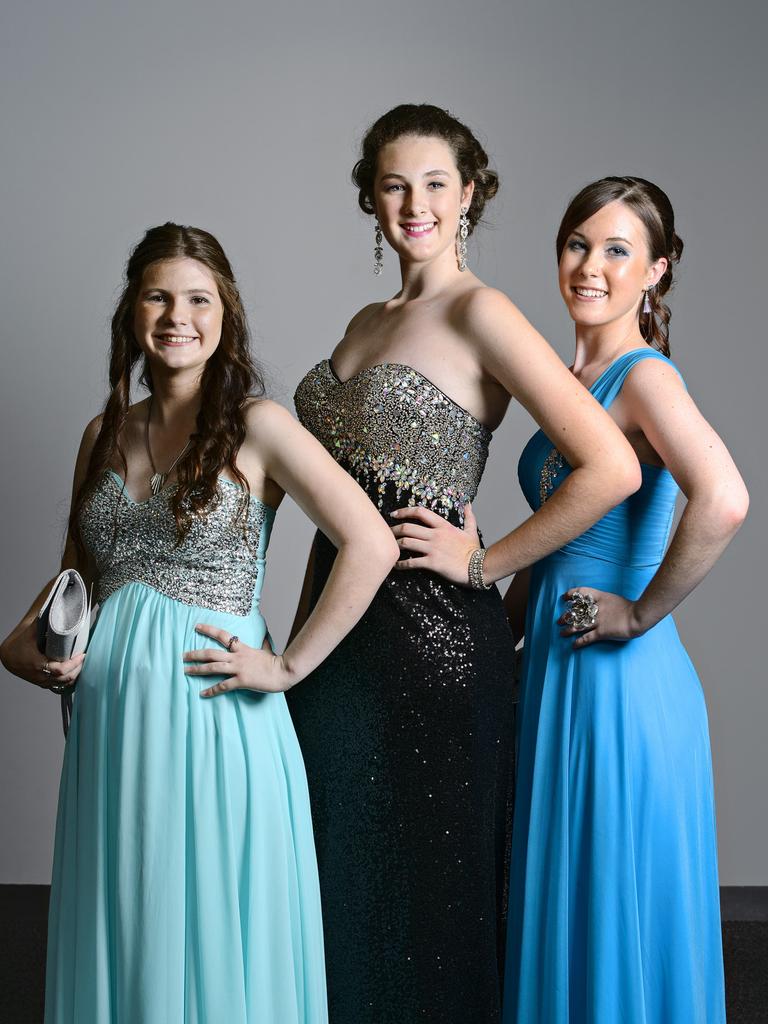 Hecitta Kondakov, Layla Hafner and Kirsten Emory at the 2014 Good Shepherd Lutheran College formal at the Darwin Convention Centre. Picture: NT NEWS