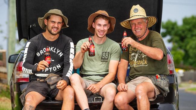 Tradies Kobe Timms, Ollie Amici and Craig Trahair have a knock-off Carlton Draught after a long day on the tools. Picture: Mark Stewart.