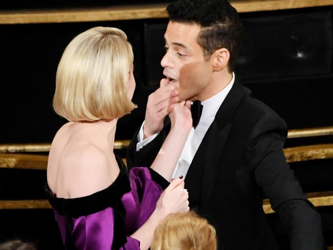 A candid moment between Lucy Boynton and Rami Malek. Picture: Getty Images