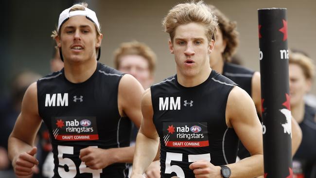 Dylan Stephens, right, ran a 6.01min 2km time trial at the national draft combine. Picture: Dylan Burns/AFL Photos.