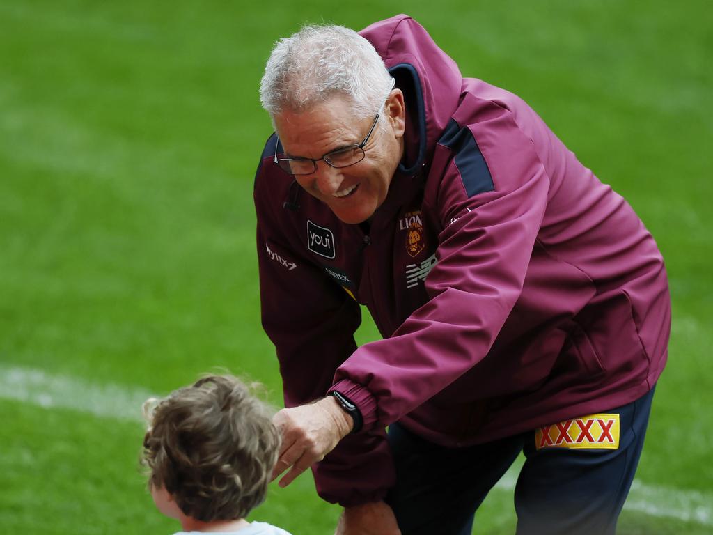 Chris Fagan shares a laugh with a young supporter. Picture: Michael Klein