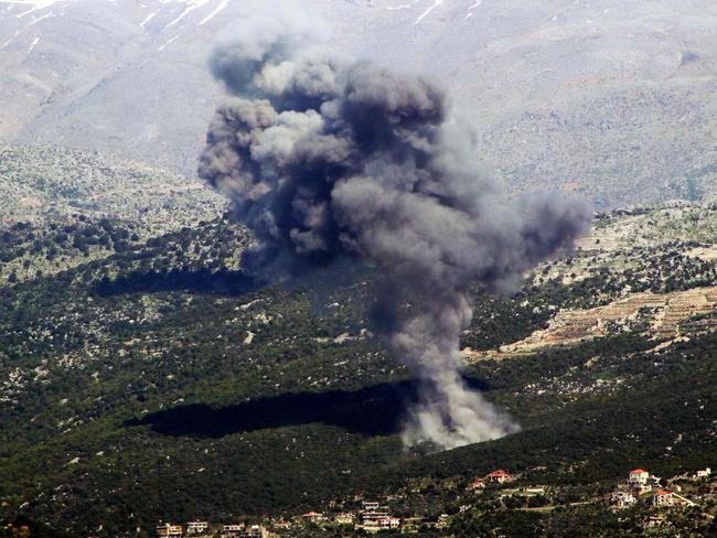 Smoke billows from the site of an Israeli air strike on the highlands of the southern Lebanese village of Habbariyeh. Picture: AFP