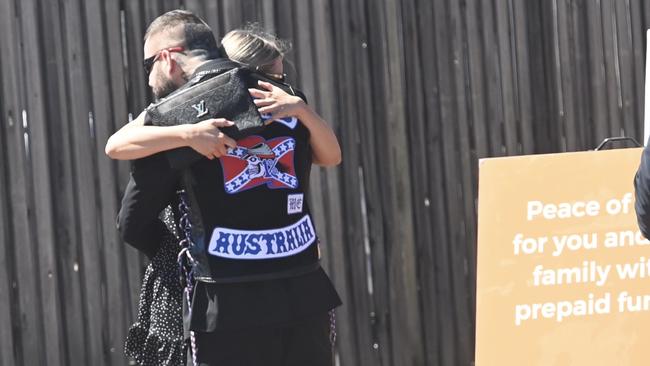 Mourners arrive at the funeral home in North Perth.