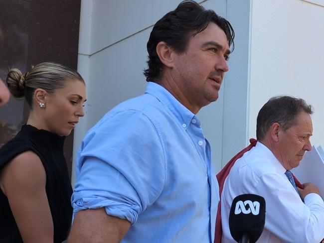 Outback Wrangler Matt Wright leaving the Supreme Court of the Northern Territory at Darwin on October 24, 2024, alongside his wife Kaia and his barrister David Edwardson. Picture: Zizi Averill