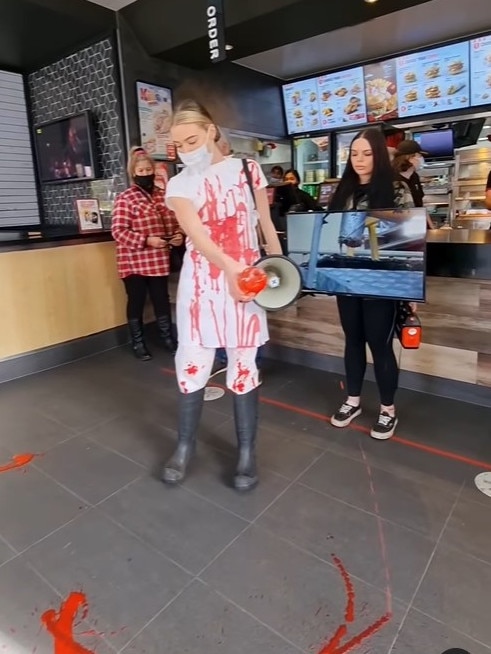 Perth vegan activist Tash Peterson struck again, disrupting a KFC restaurant. Picture: Instagram