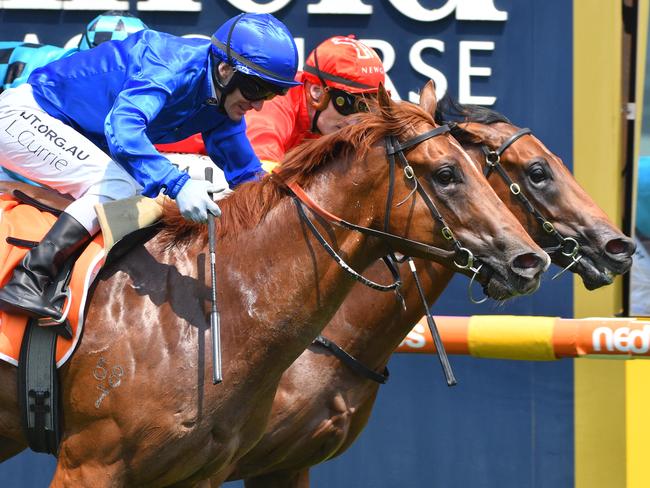 Jockey Luke Currie rides Hanseatic (L) to victory from Mark Zahra riding Rulership in race 4, the Neds Blue Diamond Prelude (C&g), during Caulfield Orr Stakes at Caulfield Racecourse in Melbourne, Saturday, February 8, 2020. (AAP Image/Vince Caligiuri) NO ARCHIVING, EDITORIAL USE ONLY