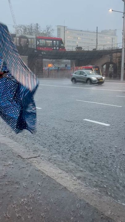 Heavy rain hammers Sydney