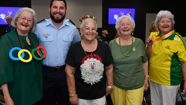 Olympic-themed Legacy Christmas function at the Townsville RSL. LAC Andrew Kapernick with Lynne Clancy, Barbara Van Rijswijk, Marilyn Kwas and Margaret Scorse. Picture: Evan Morgan