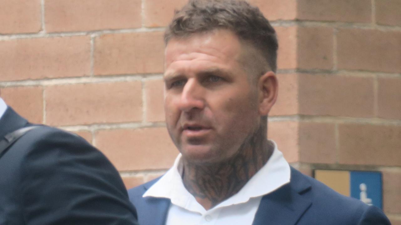 Malcolm Thomas Mote (right), of Dooralong, talking with his lawyer outside Wyong Local Court before he pleaded guilty to supplying nearly 3kg of cocaine and was led into custody. Picture: NewsLocal