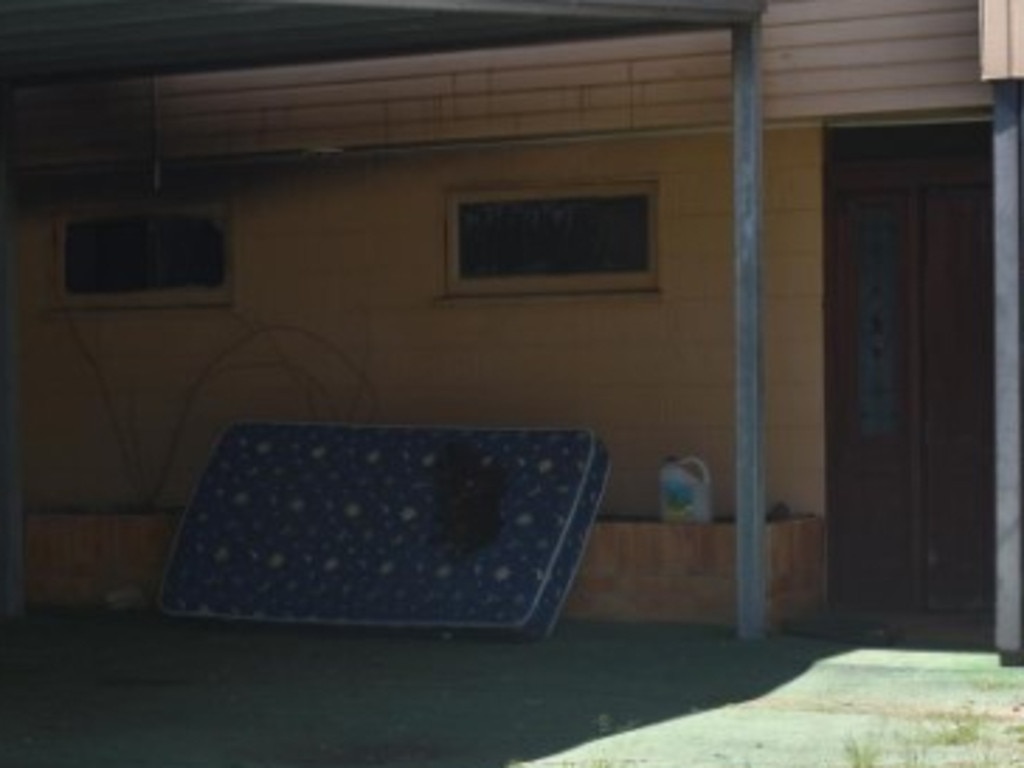 Images from the scene the day after the arson reveal the mattress burned in the initial arson attempt.