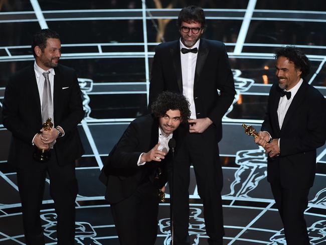 Screenwriters Alexander Dinelaris, Armando Bo, Nicolas Giacobone, and Alejandro Gonzalez Inarritu accept Best Original Screenplay for 'Birdman' at the Oscars / Picture: Getty Images