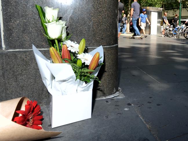 Flowers left at the scene of the Bourke Street terror attack. Picture: Andrew Henshaw