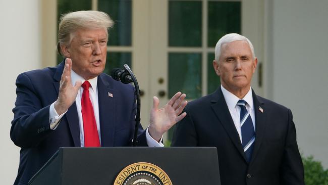 Former president Donald Trump speaks alongside Mike Pence. The two are facing questions by a special counsel over the 2020 election.