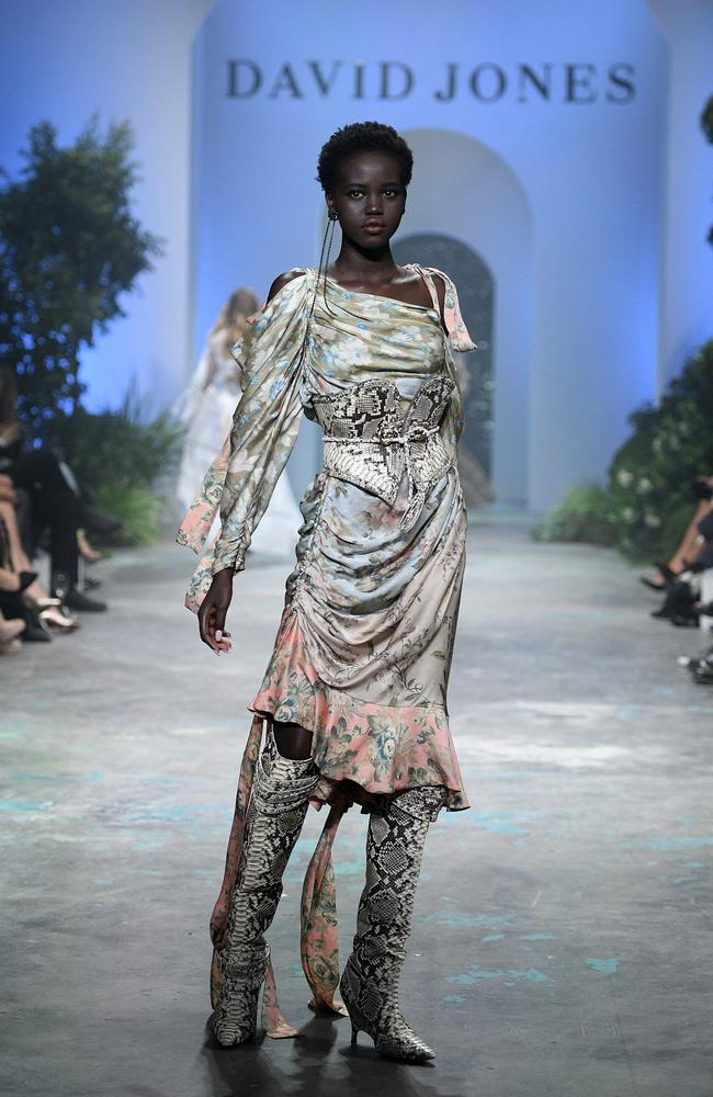 Adelaide model Adut Akech walks the runway during the David Jones Spring Summer 2018 collections launch in Sydney. Picture: AAP  /Dan Himbrechts