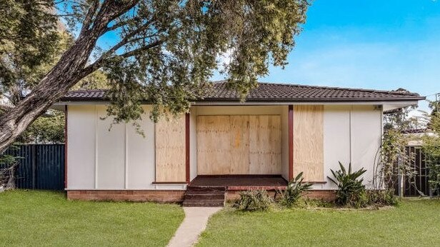 This boarded up home is for sale in Blackett, one of the last locations still affordable for those buying with a $600,000 mortgage.