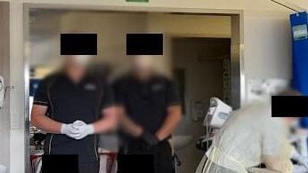 Photos from inside Bundaberg Hospital's surgical ward taken this week. This image appears to show security guards observing the surgical ward.