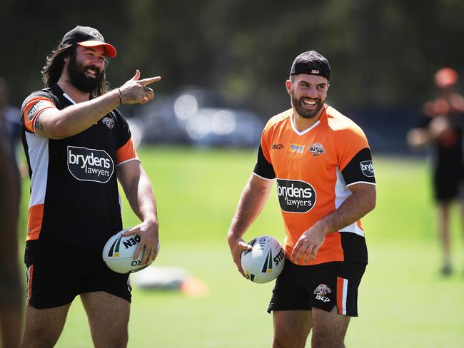 Tigers captain Aaron Woods and James Tedesco share a laugh during training at Concord Oval. Picture: Phil Hillyard