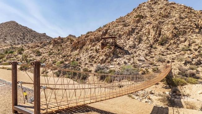 The customised bridge leads to a mountainside gazebo. Picture: MLS