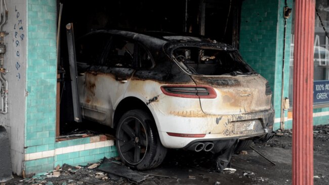 A Porsche was driven into the Thomastown hair salon.  Picture: Andrew Henshaw