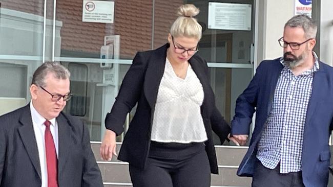 Nicole Kristeen McClymont, 34, pleaded guilty on May 24 in Rockhampton District Court to one count of stalking and one of burglary. Pictured leaving Rockhampton courthouse with lawyer (left) David Mills.