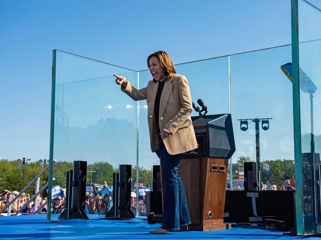 TOPSHOT - US Vice President and Democratic presidential candidate Kamala Harris gestures as she arrives to speak at a campaign event at the Throwback Brewery, in North Hampton, New Hampshire, on September 4, 2024. (Photo by Joseph Prezioso / AFP)