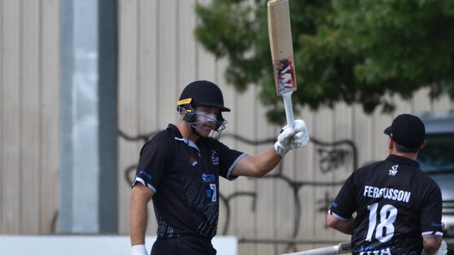 Ned Cooper brings up his century against Lara. Picture: Mark Brunger.