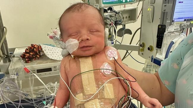 An Imbil family has put a call for help out through a GoFundMe after their newborn had open-heart surgery within a day of his birth. Samantha Peake (mother), David Myers (father) and Leo Allan Myers. Picture: (supplied)