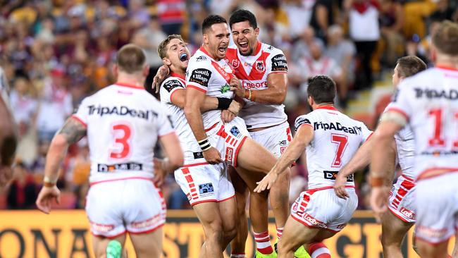 Corey Norman and his Dragons teammate celebrate victory. Picture: Bradley Kanaris/Getty Images