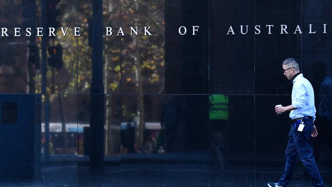 A man walks past the Reserve Bank of Australia (RBA) building in Sydney. Picture: AAP