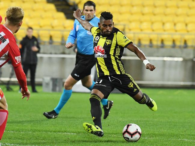 Roy Krishna of the Phoenix strikes the ball for his goal against Melbourne City FC during the Round 26 A-League match between the Wellington Phoenix and Melbourne City at Westpac Stadium in Wellington, New Zealand, Sunday, April 21, 2019. (AAP Image/Ross Setford) NO ARCHIVING, EDITORIAL USE ONLY