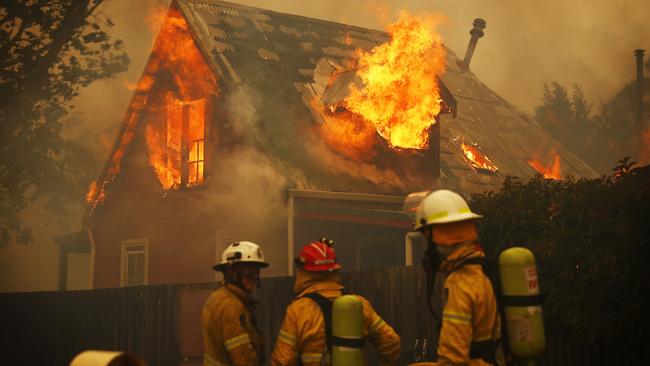 Sam Ruttyn’s dramatic photo of a fireball exploding through the upstairs window of a Balmoral home on December 21.