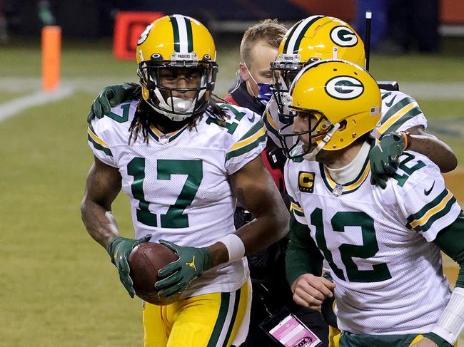 CHICAGO, ILLINOIS - JANUARY 03: Davante Adams #17 of the Green Bay Packers celebrates with Aaron Rodgers #12 after scoring a touchdown against the Chicago Bears during the fourth quarter in the game at Soldier Field on January 03, 2021 in Chicago, Illinois.   Jonathan Daniel/Getty Images/AFP == FOR NEWSPAPERS, INTERNET, TELCOS & TELEVISION USE ONLY ==