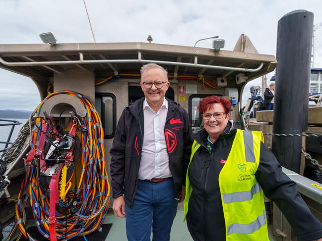 STRAHAN, TASMANIA, AUSTRALIA - NewsWire Photos - 14 DECEMBER, 2024: The Australian Prime Minister Anthony Albanese (L) and Tasmanian Senator Anne Urquhart (C) visit the Tassal salmon pens in Strahan, Tasmania. Picture: POOL / NewsWire