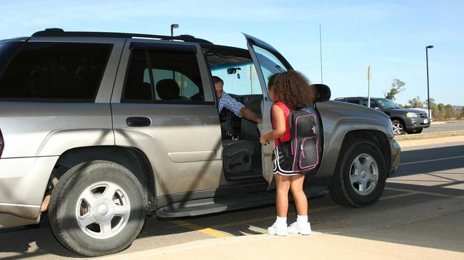 HEALTH FEARS: Are children breathing in dangerous car fumes while waiting outside schools for their parents to pick them up? Picture: Jaimie Duplass