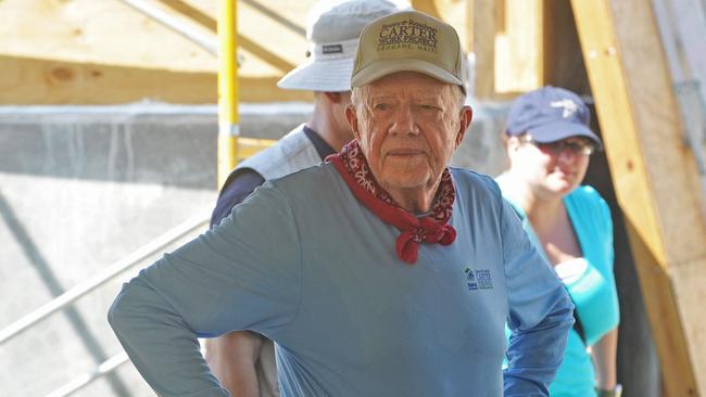 Former US president Jimmy Carter helped build and repair more than 4000 homes with global non-profit Habitat for Humanity. Picture: Thony Belizaire / AFP